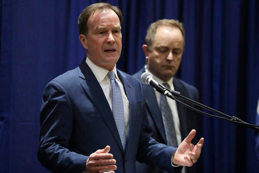 Michigan Attorney General Bill Schuette addresses a news conference, Tuesday, Dec. 20, 2016, in Flint, Mich., where he charged two former State of Michigan Emergency Managers, Darnell Earley and Gerald Ambrose, with multiple 20-year felonies for their failure to protect the citizens of Flint from health hazards cased by contaminated drinking water. Schuette also charged Earley, Ambrose and Flint city employees Howard Croft and Daugherty Johnson with felony counts of false pretenses and conspiracy to commit false pretenses in the issuance of bonds to pay for a portion of the water project that led to the crisis. (AP Photo/Carlos Osorio)