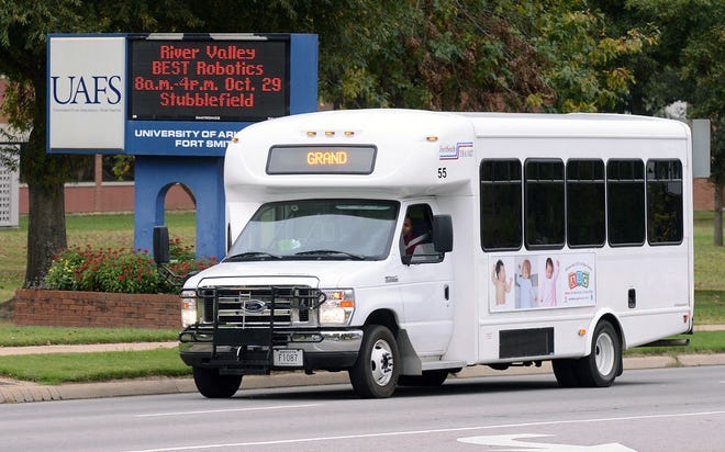 A Fort Smith Transit bus travels on Grand Avenue past the University of Arkansas at Fort Smith on Wednesday, Oct. 26, 2016. BRIAN D. SANDERFORD/TIMES RECORD