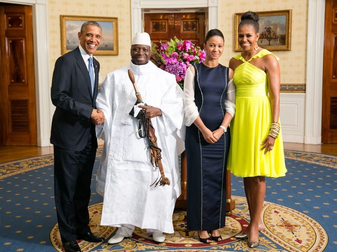 President Barack Obama and first lady Michelle Obama greet President Yahya Jammeh of Gambia and Mrs. Zineb Jammeh during a U.S.-Africa Leaders Summit dinner at the White House, Aug. 5, 2014.