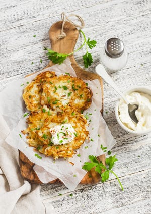 Potato pancakes or latkes are an age-old dish that has found new popularity for those celebrating Hanukkah. Thinkstock photo