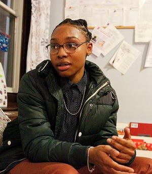 Bri Nichols in the community room of Ruth House, the shelter that was her former home.