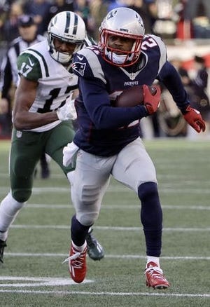 Patriots cornerback Malcolm Butler returns an interception during the second half of 41-3 victory over the Jets Saturday in Foxboro. AP PHOTO/ELISE AMENDOLA