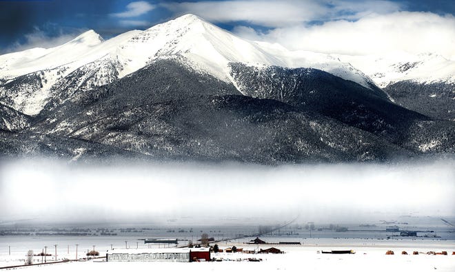 CHIEFTAIN PHOTO/CHRIS McLEAN Ground fog gathers at the foot of the Sangre de Cristos on the floor of the Wet Mountain Valley near Westcliffe in April.