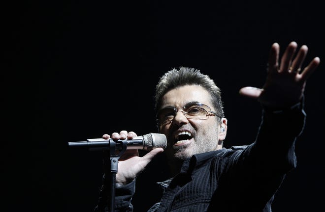 FILE- In this June 25, 2008, file photo, singer George Michael performs during his “Live Global Tour” concert in Inglewood, Calif. Michael, who rocketed to stardom with WHAM! and went on to enjoy a long and celebrated solo career lined with controversies, has died, his publicist said Sunday, Dec. 25, 2016. He was 53. (AP Photo/Matt Sayles, File)