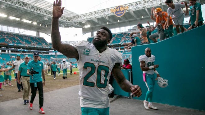 Miami Dolphins free safety Reshad Jones (20) exits stadium after win over the Steelers at Hard Rock Stadium in Miami Gardens, Florida on October 16, 2016. (Allen Eyestone / The Palm Beach Post)