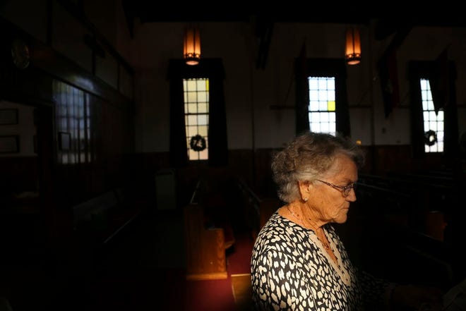 In this Dec. 7, 2016 photo, Kathryn Woodward, 92, has started a one-woman campaign to save the old World War II- era Memorial Chapel at Fort Jackson, S.C. All wooden structures on the fort from that era have been torn down or are slated for demolition. "Even if it were not to remain as a chapel as such," she said. "It should somehow be preserved as a memorial." (Gerry Melendez/The State via AP)