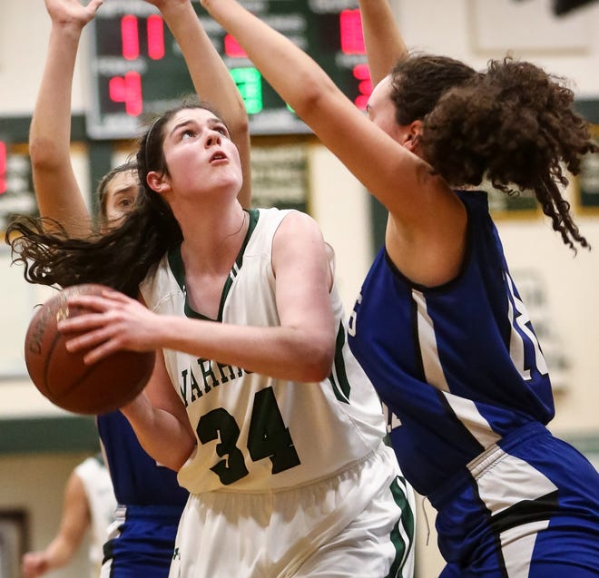 Nipmuc's Kylie Gallagher goes up for a layup during the Warriors 38-31 win over Dover-Sherborn on Tuesday. Daily News and Wicked Local Photo/Dan Holmes