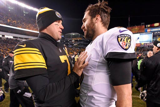 Pittsburgh Steelers quarterback Ben Roethlisberger (7) talks with Baltimore Ravens quarterback Joe Flacco (5) following an NFL football game in Pittsburgh, Sunday, Dec. 25, 2016. The Steelers won 31-27. (AP Photo/Don Wright)