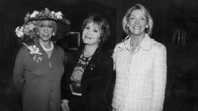 Carrie Fisher, between Barbara Katz and Althea Powers-Toubail, visited Palm Beach in 2002. Melanie Bell / Daily News File Photo
