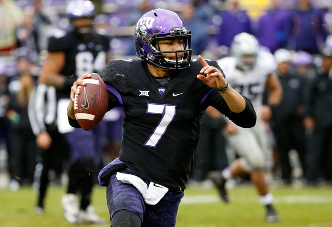 TCU quarterback Kenny Hill (7) looks to pass during the second half of an NCAA college football game against Kansas State, Saturday, Dec. 3, 2016, in Fort Worth, Texas. Kansas State won 30-6. (AP Photo/Ron Jenkins)