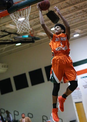 East Lincoln's Sidney Dollar (1) drives for a lay up against East Gaston on Wednesday during the East Lincoln Winter Jam. Bill Bostick/Special to The Gazette