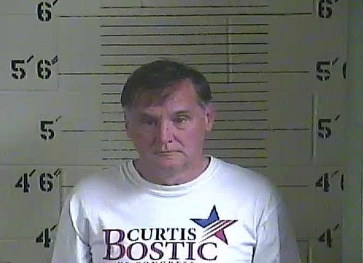 In this Dec. 18 photo provided by Three Forks Regional Jail, Ky., Curtis Bostic appears in a booking photo. Bostic, a former South Carolina Republican congressional candidate, is accused of stealing horses in rural Kentucky earlier this month, but he contends he was actually rescuing the horses. Charleston media outlets report that Bostic, was arrested Dec. 18 near Jackson, Kentucky, and charged with felony unlawful taking of livestock. He was released on $2,500 bail the next day. (Three Forks Reginal Jail/The Post And Courier via AP)