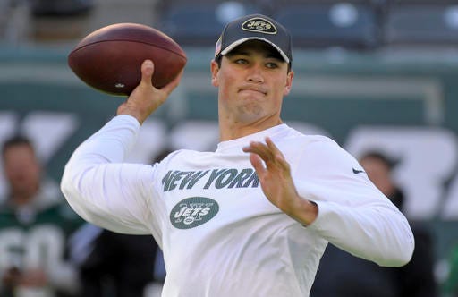 FILE - In this Nov. 13, 2016, file photo, New York Jets quarterback Christian Hackenberg throws a pass before the team's NFL football game against the Los Angeles Rams in East Rutherford, N.J. Hackenberg will swap his sweats for shoulder pads and a helmet on the Jets' sideline Sunday, Jan 1. That actually counts as progress for the rookie quarterback, who'll be active for a regular-season game for the first time in his NFL career. While some fans and media have spent the last several days clamoring for Todd Bowles to start Hackenberg over Ryan Fitzpatrick in the season finale against Buffalo, the second-round pick will remain patient and wait for his turn to play. (AP Photo/Bill Kostroun, File)