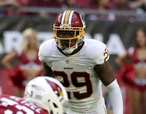In this photo taken Dec. 4, 2016, Washington Redskins strong safety Duke Ihenacho (29) watches during an NFL football game against the Arizona Cardinals in Glendale, Ariz. Mixing and matching safeties since late last season, the Washington Redskins have no choice but to use a safety-by-committee approach in their must-win finale. (AP Photo/Rick Scuteri)