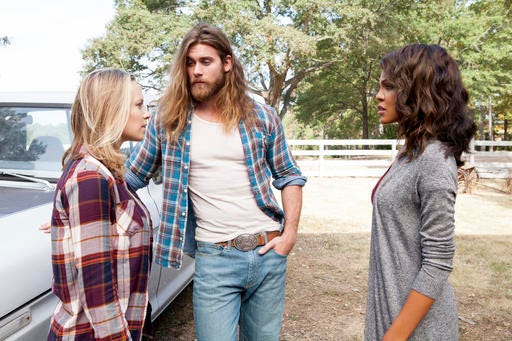 This image released by TLC shows form left to right, Danielle Savre as Anna, Brock O’Hurn as Brody and Crystle Stewart as Frankie in a scene from Tyler Perry’s TLC drama “Too Close to Home.” (TLC via AP)