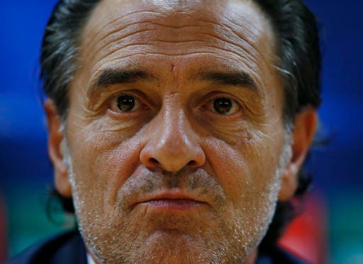 FILE - In this Tuesday, Sept. 30, 2014 file photo, Galatasaray manager Cesare Prandelli of Italy, listens to a reporter's question during a media conference before a training session at the Emirates Stadium in London, ahead of their Champions League Group D soccer match against Arsenal Wednesday. Valencia says in a statement released Friday Dec. 30, 2016, Italian manager Cesare Prandelli has resigned after three months in charge of the Spanish team. (AP Photo/Lefteris Pitarakis, File)
