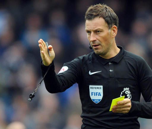 FILE - This is a Sunday, Oct. 23, 2016  file photo of English referee Mark Clattenburg during the English Premier League soccer match between Manchester City and Southampton at the Etihad Stadium in Manchester, England. In the hours and days after blowing the final whistle, Mark Clattenburg endures hidden anguish as the decisions made during 90 minutes of refereeing whirl through his mind.(AP Photo/Rui Vieira, File)