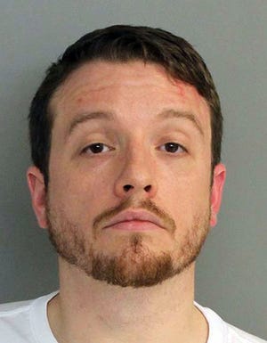 This Tuesday, Dec. 27, 2016 photo provided by the Aiken County Detention Center, S.C., shows South Carolina Rep. Chris Corley, who authorities said attacked his wife in their Graniteville home. He was charged with first-degree domestic violence. (Aiken County Detention Center via AP)