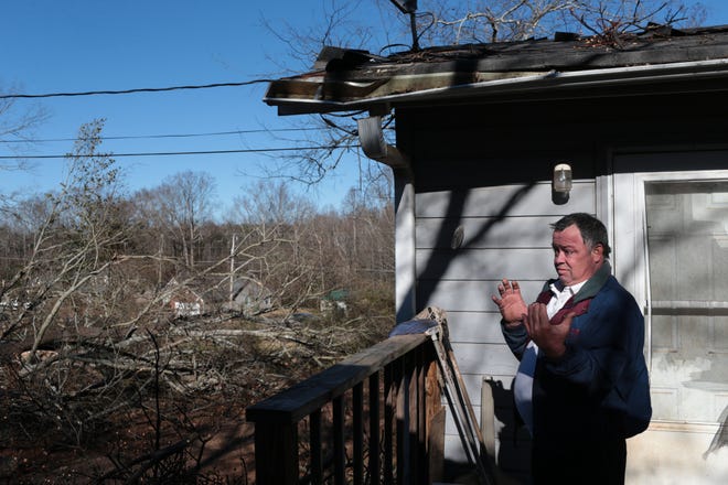 Gary Jones describes the sound of the tornado that struck in Jackson County early Thursday morning, Friday, December 30, 2016. Jones’ home and vehicle received damage from the tornado. Several dozen homes were damaged but no injuries have been reported according to Jackson County Fire Chief Mark Duke in a press release. The tornado travelled along a three-mile-long path that was a half-mile wide. (Photo/ John Roark, Athens Banner-Herald)