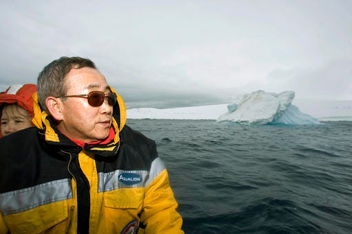 In this Nov. 9, 2007 photo provided by the United Nations, U.N. Secretary-General Ban Ki-moon looks out over the waters off King George Island, Antarctica. Passionate about the environment, Ban worked to raise climate change close to the top of the global agenda. (Eskinder Debebe/The United Nations via AP)