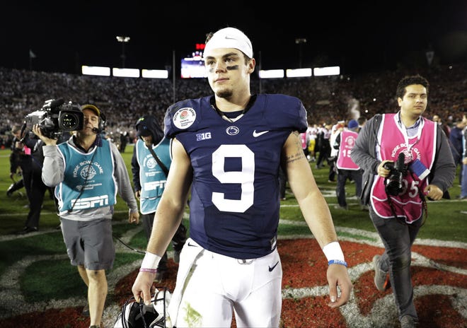 Penn State quarterback Trace McSorley leaves the field after the Nittany Lions' loss to Southern California in the Rose Bowl on Monday, Jan. 2, 2017, in Pasadena, California. (AP Photo/Jae C. Hong)