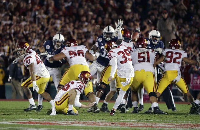 Southern California place kicker Matt Boermeester kicks the game winning field goal against Penn State during the second half of the Rose Bowl on Monday in Pasadena, Calif.