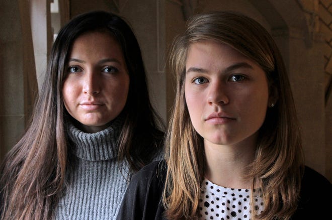 Providence College students Cassandra Caggiano, left, and Colleen Andersen have established a PC chapter of Active Minds, a nonprofit group formed to combat the stigma of mental illness on college campuses. The Providence Journal / David DelPoio