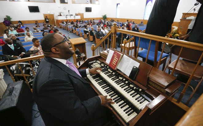 Matthew Wilson sings and plays the organ during the Emancipation Proclamation Celebration at Mount Galilee Baptist Church in Northport Monday, January 2, 2017. Staff Photo/Gary Cosby Jr.
