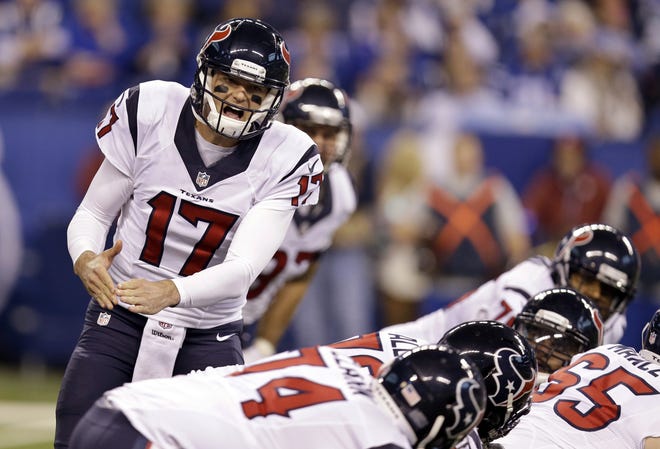 Houston Texans quarterback Brock Osweiler yells on the line of scrimmage during the first half of a game against the Indianapolis Colts on Dec. 11 in Indianapolis. Osweiler is getting a second chance to start for the Houston Texans. With Tom Savage still in the concussion protocol, the Texans will look to their $72 million man to lead them in their wild-card playoff game against Oakland on Saturday. (AP Photo/Michael Conroy, File)