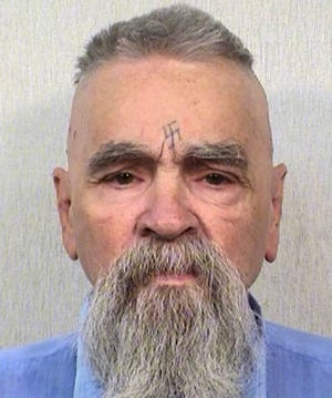 California prison officials say cult killer Charles Manson is alive following reports that he was hospitalized on Tuesday.