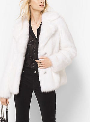 Now is the time to buy statement pieces like this jacket from Michael Kors on sale. (www.michaelkors.com)