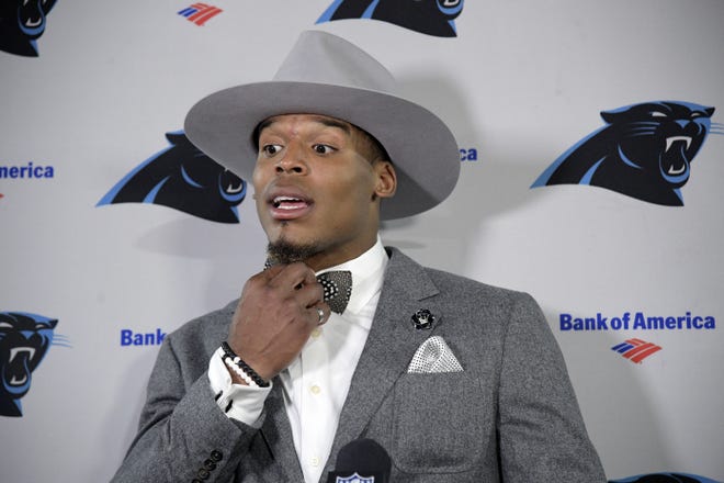 Carolina Panthers quarterback Cam Newton answers a question during a post-game news conference after an NFL football game against the Tampa Bay Buccaneers in Tampa, Fla., Sunday, Jan. 1, 2017. The Buccaneers won 17-16. (AP Photo/Phelan M. Ebenhack)