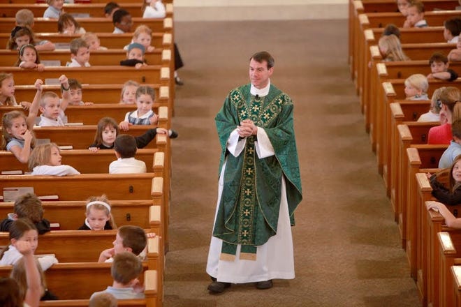SUBMITTED PHOTO



The Rev. David Richardson has spent most of his career at St. Philomena Catholic Church in Peoria, which is growing in number of parishoners and in the size of its physical plant.