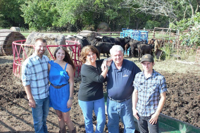 Leroy Russell, of Shawnee County, and his family were honored in December as the Kansas Farm Bureau District 1 “Farm Family of the Year.” From left are Tanner McCrary, Natalie Russell’s fiance; Natalie; Kristi; Leroy; and Tanner Russell. (Submitted)