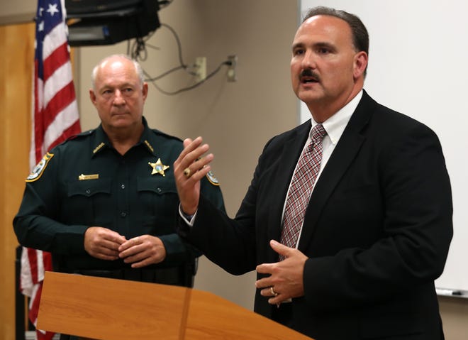 Panama City Police Chief Scott Ervin answers press questions with Bay County Sheriff Frank McKeithen after a shooting in July 2014. Seven people were killed within nine weeks that summer. The department last year requested several more officers but was granted mostly reserve positions. NEWS HERALD FILE PHOTO