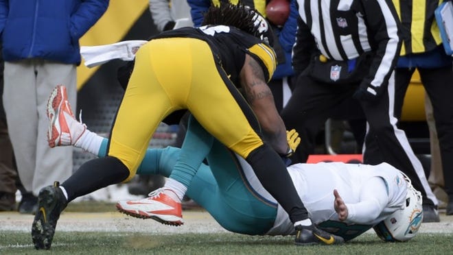 Pittsburgh Steelers outside linebacker Bud Dupree (48) hits Miami Dolphins quarterback Matt Moore (8) during the first half of an AFC Wild Card NFL football game in Pittsburgh, Sunday, Jan. 8, 2017. Moore remained in the game. (AP Photo/Fred Vuich)