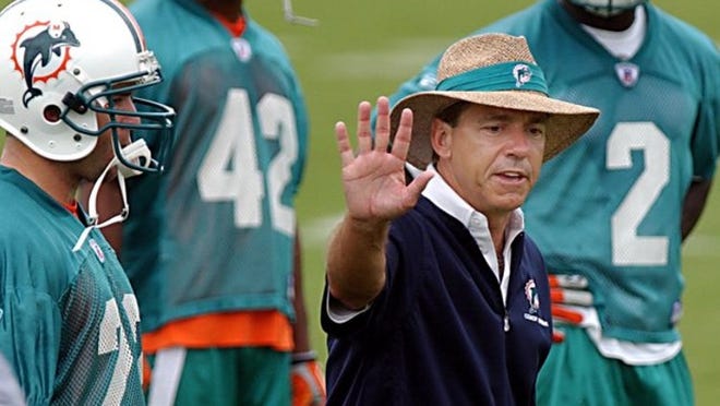 Miami Dolphins coach Nick Saban gives directions during minicamp Friday, June 10, 2005, at the Dolphins' training facility in Davie, Fla. (AP Photo/Miami Herald, Walter Michot) ORG XMIT: FLMIH102 ORG XMIT: MER0506101722132062 ORG XMIT: MER0706121133192912