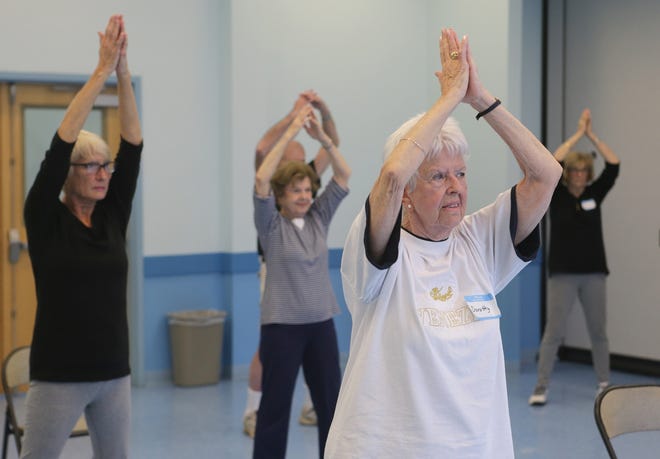 Dorothy Stovold and others practice tai chi at the Panama City Beach Senior Center. NEWS HERALD FILE PHOTO