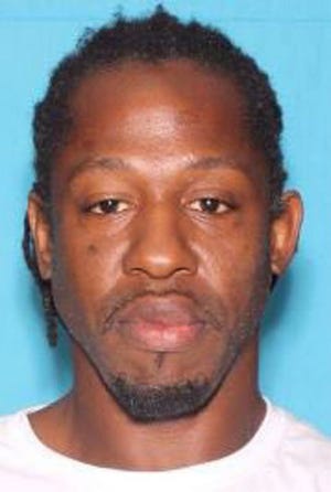 In this undated photo made available by the Orlando Police Department shows Markeith Loyd. Loyd is wanted for killing an Orlando police officer outside a Walmart in Orlando on Monday, Jan. 9, 2017. Loyd is also accused of murdering his pregnant ex-girlfriend last month. (Orlando Police Department via AP)