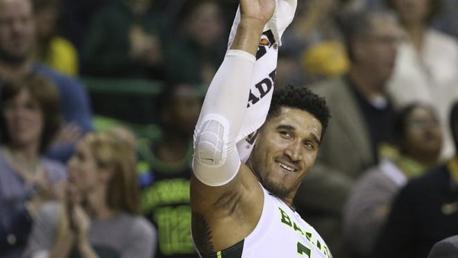 Baylor guard Ish Wainright encourages a record overflow crowd at the Ferrell Center on Saturday. The Bears men’s team is No. 1 for the first time in school history. CREDIT: Rod Aydelotte/AP