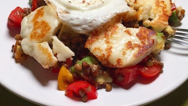 As is the tradition in Hungary, Aurel Pop (@gourmetcubicle, gourmetcubicle.com) — who is from nearby Romania — made lentils on the first day of the year because they symbolize money and wealth. This year, he made a lentil salad with grilled haloumi cheese and a fried egg. Contributed by @gourmetcubicle