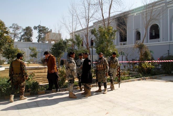 Afghan security forces are seen in front of Kandahar guesthouse after a bomb blast in Kandahar, Afghanistan, Wednesday, Jan. 11, 2017. The United Arab Emirates said on Wednesday that five of its diplomats were killed in a bombing in southern Afghanistan the day before, the deadliest attack to ever target the young nation's diplomatic corps. (AP Photos/Allauddin Khan)