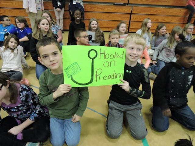Students at Farmer Elementary School offer signs of hope.