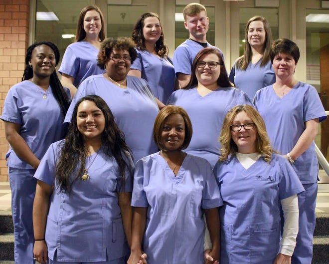Cleveland Community College honored a group of phlebotomy students during a ceremony in December. Pictured, front row from left, are Rosa Flores, Tara Smith and Beverly Edwards; middle row, Rhodia Hopper, Kaela Barnes, Haley Cumm and Crystal Gordon; and back row, Tiffany Elks, Carrie Timms, Branden Gordon and Amber Williams. Special to The Star