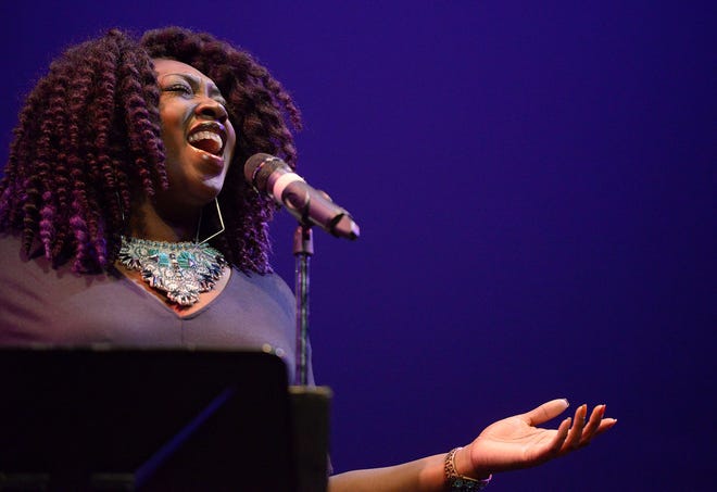 Stacia Abbott sings "Hero" by Mariah Carey during the Dr. Martin Luther King Jr. Celebration at Lincoln Park Performing Arts Center in Midland.