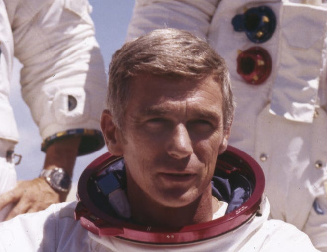 FILE - In an undated file photo provided by NASA, US Navy Commander and Astronaut for the upcoming Apollo 17, Eugene Cernan, is pictured in his space suit. NASA announced that former astronaut Cernan, the last man to walk on the moon, died Monday, Jan. 16, 2017, surrounded by his family. He was 82. (NASA via AP)