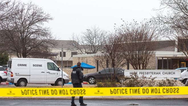 Crime scene vehicles and police tape ring the scene of an officer involved shooting outside the Hope Presbyterian Church at 11512 Olson Dr. in the foggy morning hours of Jan. 14. 01/14/17 Tom McCarthy Jr. for AMERICAN-STATESMAN