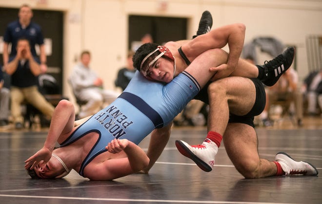North Penn's Garret Quallet and William Tennent's Yusuf Aladinov in the 182-pound match Wednesday, Jan. 11, 2016, in Warminster.