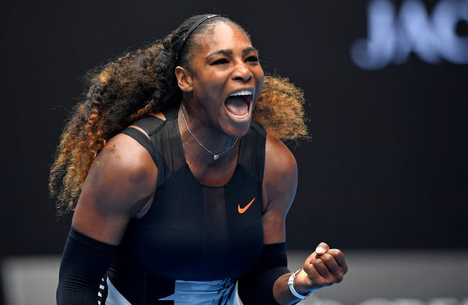 United States' Serena Williams celebrates a point win over Switzerland's Belinda Bencic during their first round match at the Australian Open tennis championships in Melbourne, Australia, Tuesday, Jan. 17, 2017. (AP Photo/Andy Brownbill)
