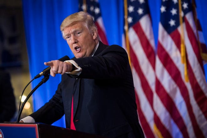 President-elect Donald Trump, seen here on Wednesday, said in a German interview that BMW would face a 35-percent import duty for foreign-built cars sold in the United States. PHOTO: Washington Post photo by Jabin Botsford